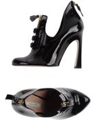 Nina Ricci High-Heel Patent Leather Moccasins - Lyst