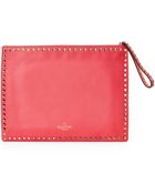 Valentino Raspberry Red Oversized Rockstud Clutch - Lyst