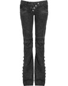 Balmain Low-rise Button-embellished Flared Jeans - Lyst