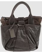 Coccinelle Medium Leather Bags - Lyst