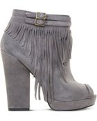 Nine West Icelandic Fringe Ankle Boots - Lyst