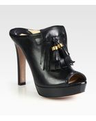 Prada Leather Tassel Platform Clogs - Lyst