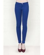 J Brand J Brand 811 Indio Blue Mid Rise Skinny Jeans - Lyst