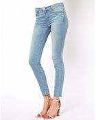 J Brand Mid Rise Distressed Skinny Jeans - Lyst