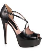 Gucci Polished Leather Crisscross Platform Pumps - Lyst