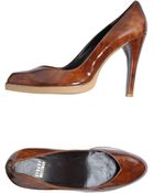 Stuart Weitzman Closedtoe Slipons - Lyst