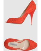 red pumps open toe