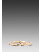 CC Skye Hinged Nail Bangle in Metallic Gold - Lyst