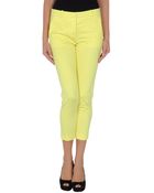 Pinko 3/4 Length Yellow Pants - Lyst
