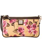 Dooney & Bourke Coated Cotton Large Slim Wristlet - Lyst