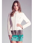 Bebe Zipper Seam Peplum Jacket - Lyst