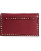Valentino Rockstud Clutch - Lyst