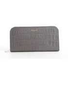 Saint Laurent Earth Leather Zip Continental Wallet - Lyst