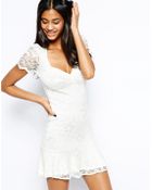 John Zack Lace Dress With Peplum Hem - Lyst