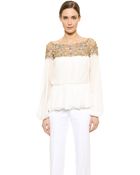 Marchesa Lace Neck Peplum Blouse - Ivory - Lyst