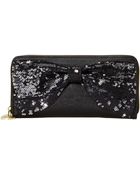 Betsey Johnson Bow Zip Around - Lyst
