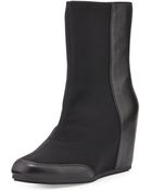 Taryn Rose Dual Stretch-Front Wedge Boot - Lyst