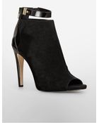 Calvin Klein Saya Peep-Toe Bootie - Lyst