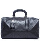 Chanel Pre-Owned Lambskin Quilted Medium Duffle Bag - Lyst