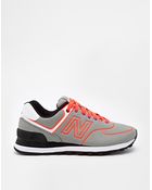 New Balance 574 Gray Neon Orange Sneakers - Lyst