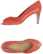 Eva Turner Pumps with Open Toe - Lyst