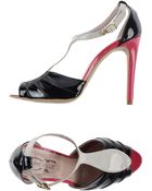 Divine Follie Sandals - Lyst