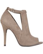 Nine West Scout Peep Toe Pumps - Lyst
