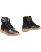 Pollini Ankle Boots - Lyst