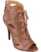 Nine West Acomplise Peep Toe Booties - Lyst
