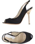 Pollini Sandals - Lyst