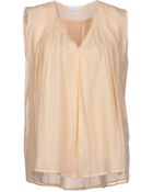 Gold Case Top - Lyst