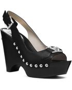 Michael Kors Logo Charm Sling-Back Leather Wedge - Lyst