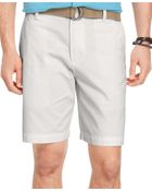 Izod Belted Twill Flat Front Shorts - Lyst