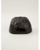 Moschino Quilted Calf Leather Cap - Lyst
