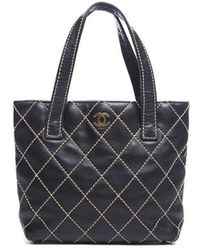 Chanel Pre-Owned Lambskin Small Surpique Tote Bag - Lyst