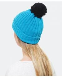 Helene Berman Pom Pom Beanie Hat - Lyst
