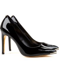 red pointed court shoes