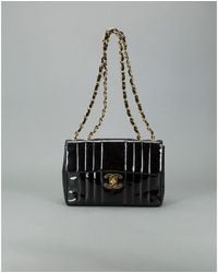 Chanel Pre-Owned: Black Patent Leather Vertical Quilt 'Maxi Flap' Bag - Lyst