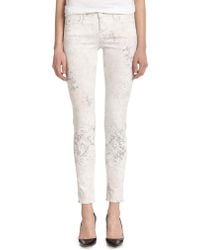 J Brand Faded Floral-Print Skinny Jeans - Lyst