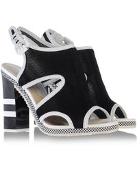 Pollini Sandals - Lyst