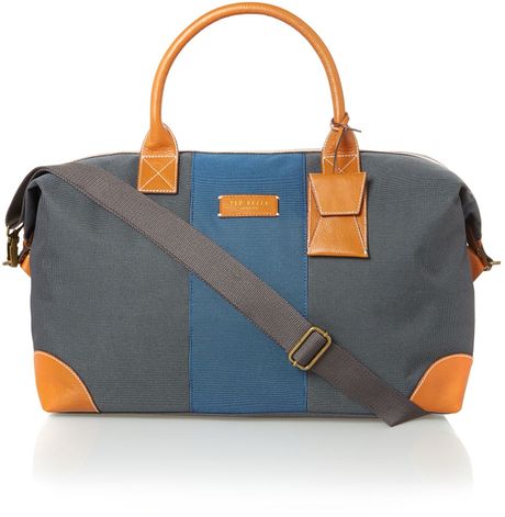 grey holdall bag