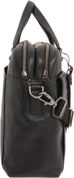 tumi leather brief