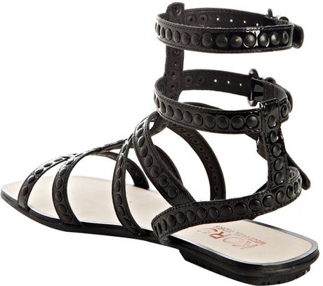 ... By Michael Kors Black Studded Patent Yes Gladiator Sandals in Black