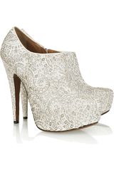 Alaïa Laser-cut Calf Hair Platform Pumps