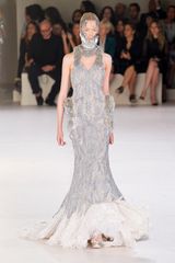 Alexander McQueen Spring 2012 Gray Sleeveless Embellished Feather Bottom Gown with Accentuated Hips And High Neck  