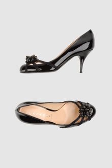 Casadei Closed Toe Slip Ons - Lyst