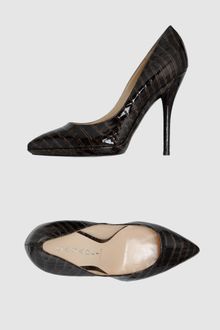 Casadei Closed Toe Slip Ons - Lyst