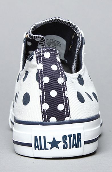 navy blue and white polka dot converse