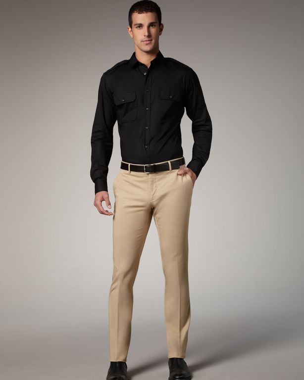 black polo shirt and khaki pants