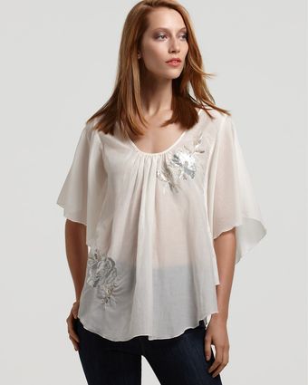 Karen Kane Flutter Sleeve Beaded Floral Top - Lyst